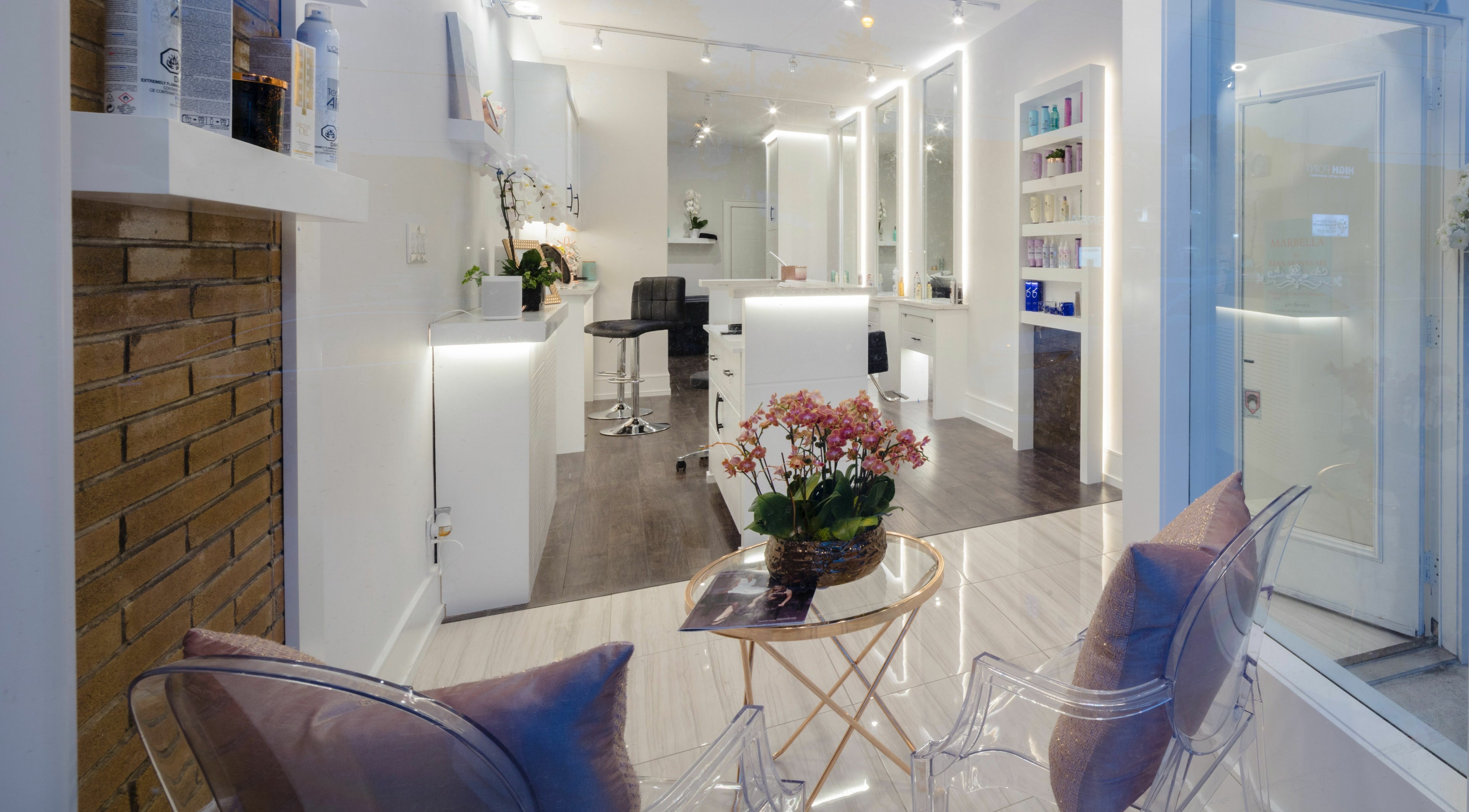 Chic interior of Marbella Hair Lab, Toronto, Ontario, CA with sleek decor and a welcoming ambiance.