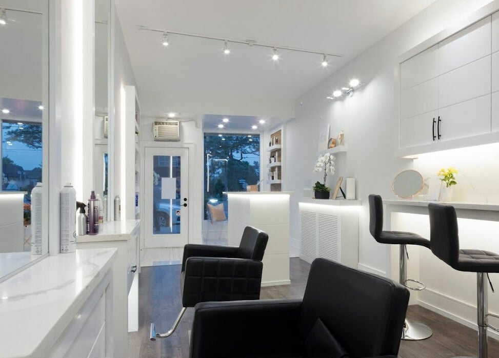 Modern interior of Marbella Hair Lab in Toronto, Ontario, CA featuring sleek, stylish decor and comfortable seating.