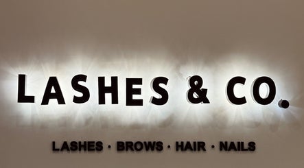 Illuminated Lashes&Co. signage in الرياض, منطقة الرياض, SA showcasing beauty services.