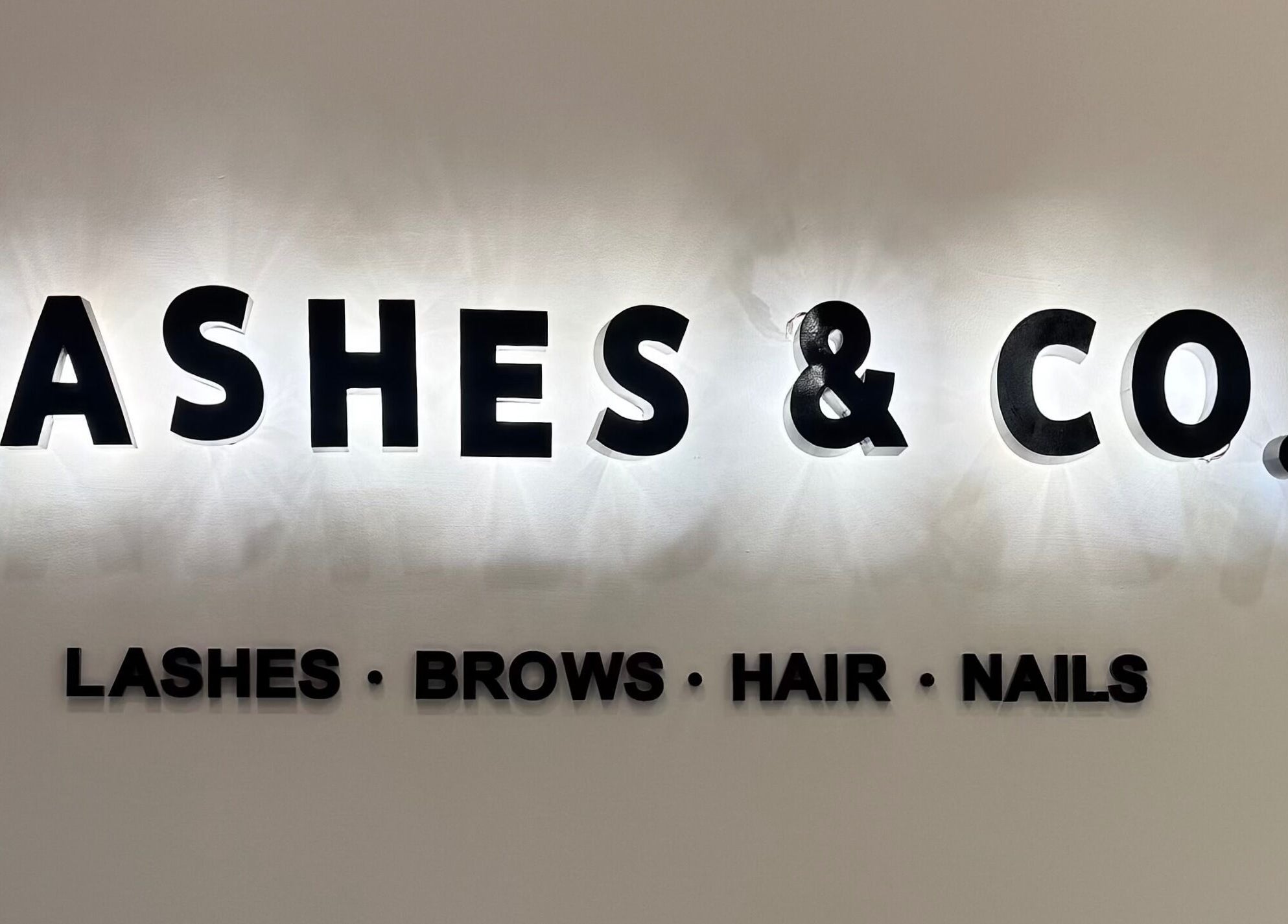 Lashes&Co. sign displaying lashes, brows, hair, nails services in الرياض, منطقة الرياض, SA.