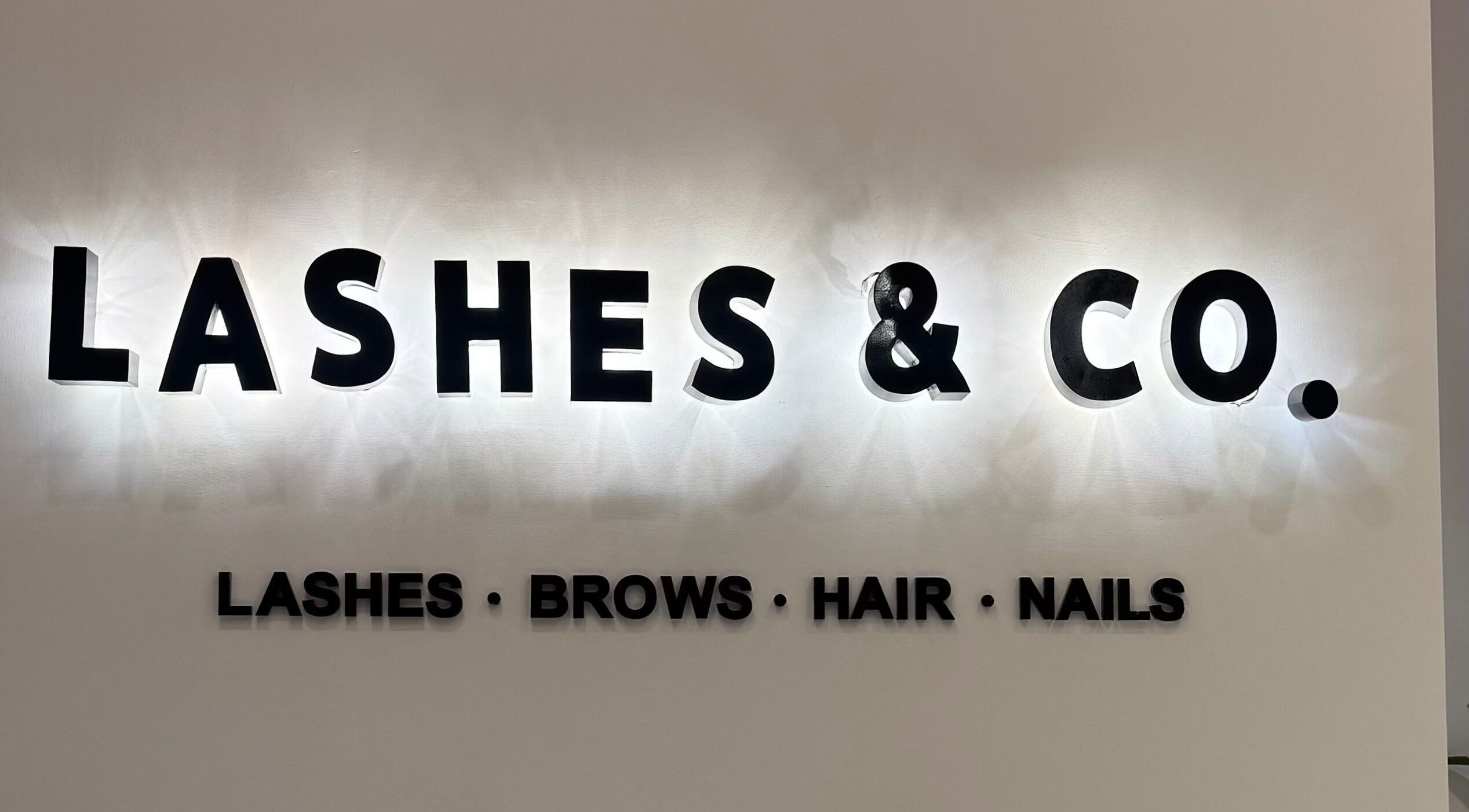 Lashes&Co. sign displaying lashes, brows, hair, nails services in الرياض, منطقة الرياض, SA.