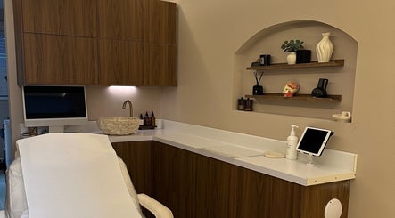 Elegant treatment room at Nadia Skin And Aesthetics, Stoke-on-Trent, England, GB featuring modern decor.