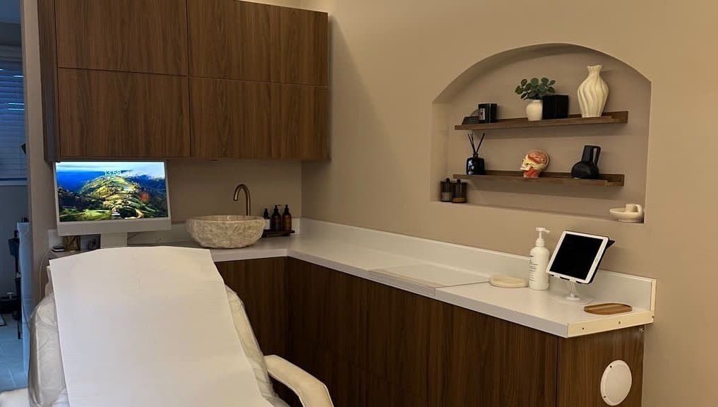 Serene treatment room at Nadia Skin And Aesthetics, Stoke-on-Trent, England, GB with elegant decor.