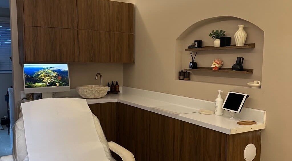 Serene treatment room at Nadia Skin And Aesthetics, Stoke-on-Trent, England, GB with elegant decor.