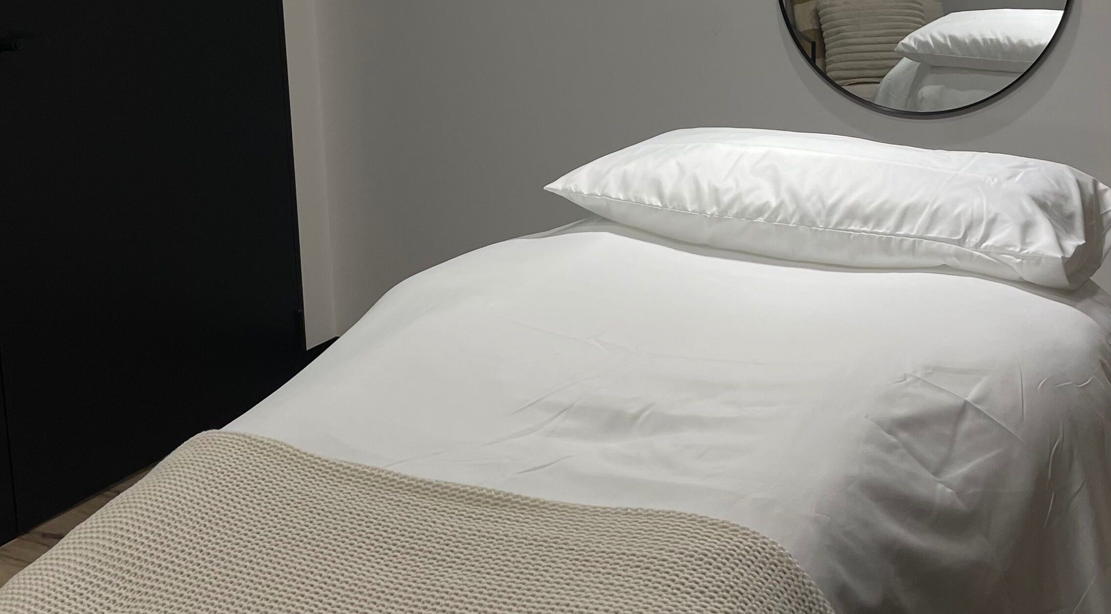 Luxurious spa treatment bed at The Face Haven, Melbourne, Victoria, AU, showcasing ultimate relaxation.