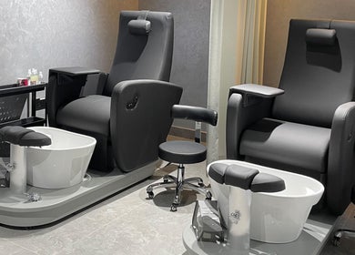 Luxurious pedicure chairs at Urban Global Barbershop, Abu Dhabi, AE, offer comfort and style.