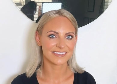 A client glows after a session at Hayley Lauren Makeup & Beauty, Featherstone, England, GB.