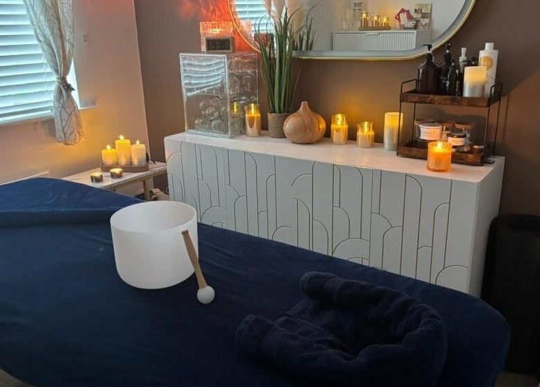 Relaxing spa room with candles at CV23 0AT in Rugby, England, GB, offering a zen ambiance for wellness.