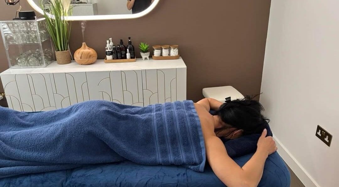 Relaxing massage session at CV23 0AT in Rugby, England, GB with a tranquil spa setting.