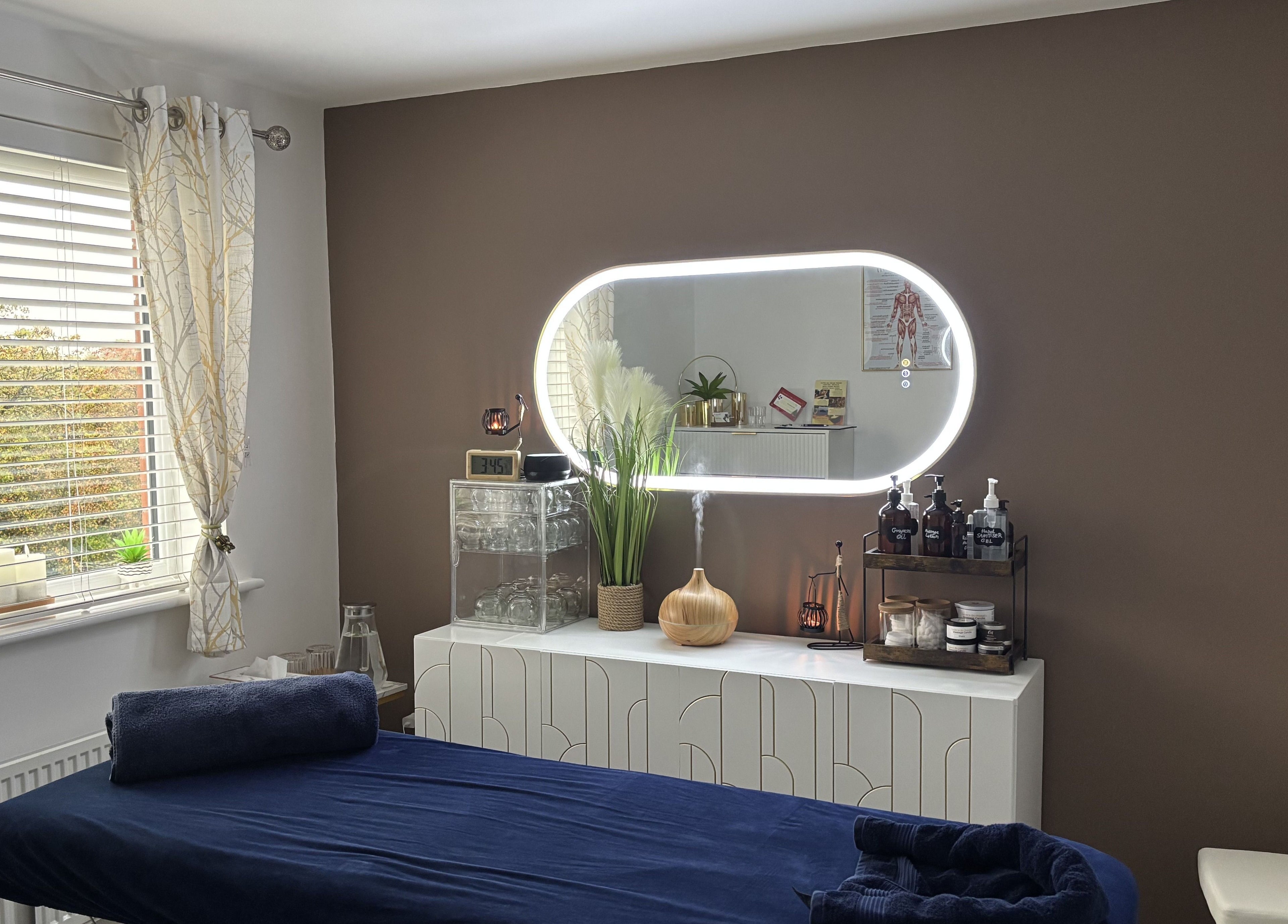 Relaxing massage room at SC Sports Massage, Rugby, England, GB, featuring a tranquil ambiance.