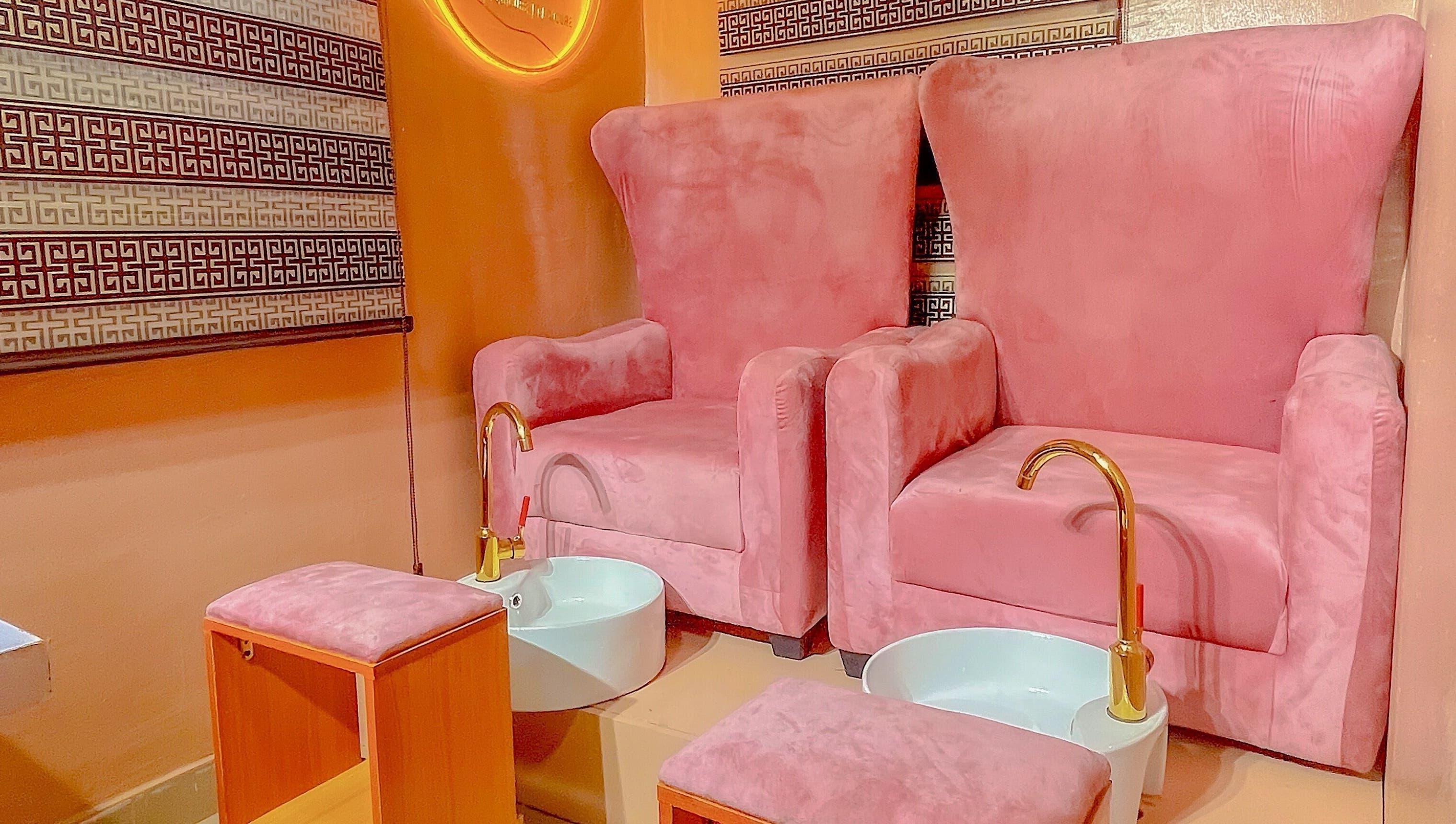 Luxurious pink pedicure chairs at KNG Beauty Bar, Lagos, Lagos, NG enhance the soothing spa experience.