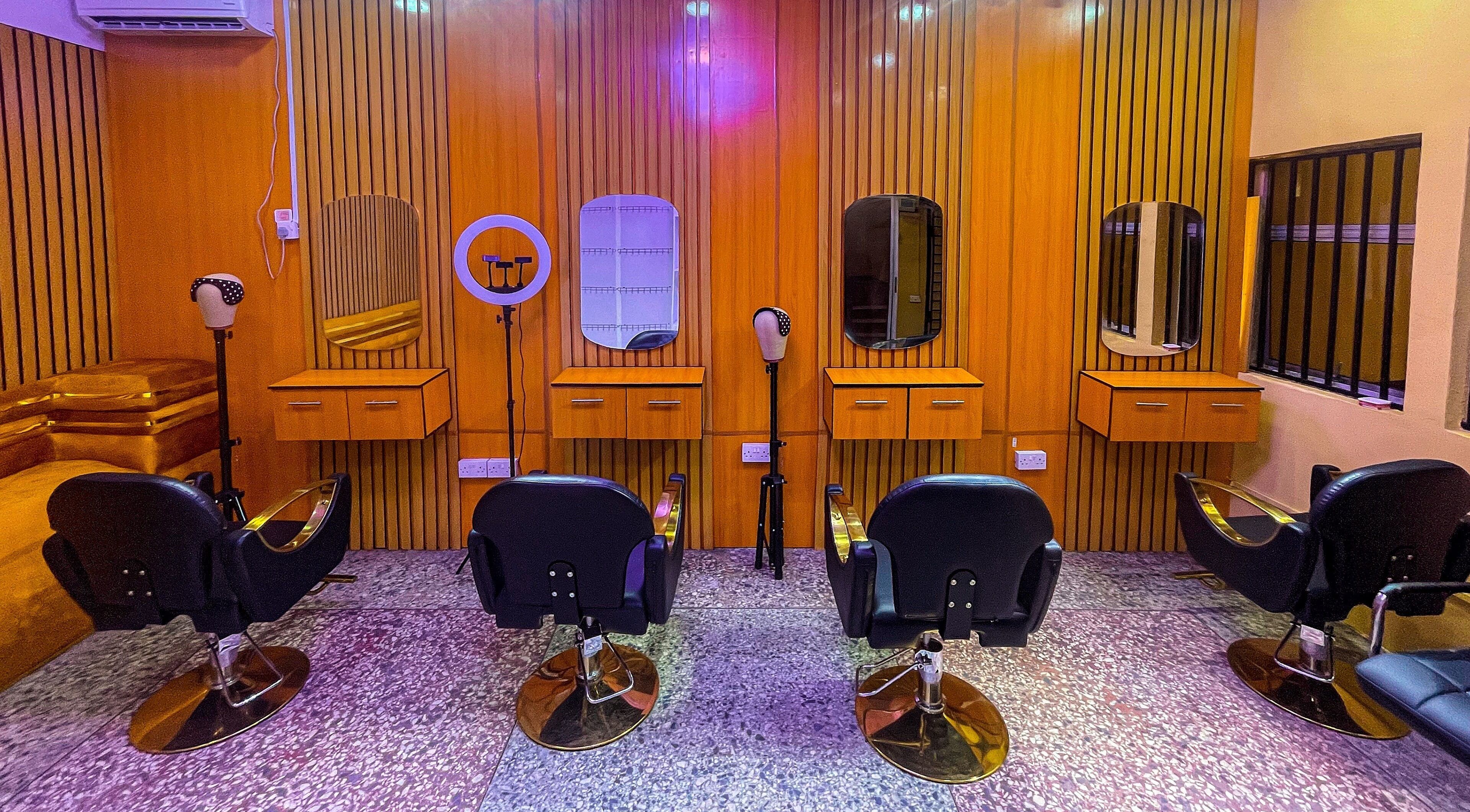 Chic hair styling stations at KNG Beauty Bar, Lagos, Lagos, NG, showcasing modern salon interior design.