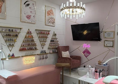 Elegant nail and beauty station at CuteTique Salon, Kissimmee, Florida, US with chic decor and cozy seating.