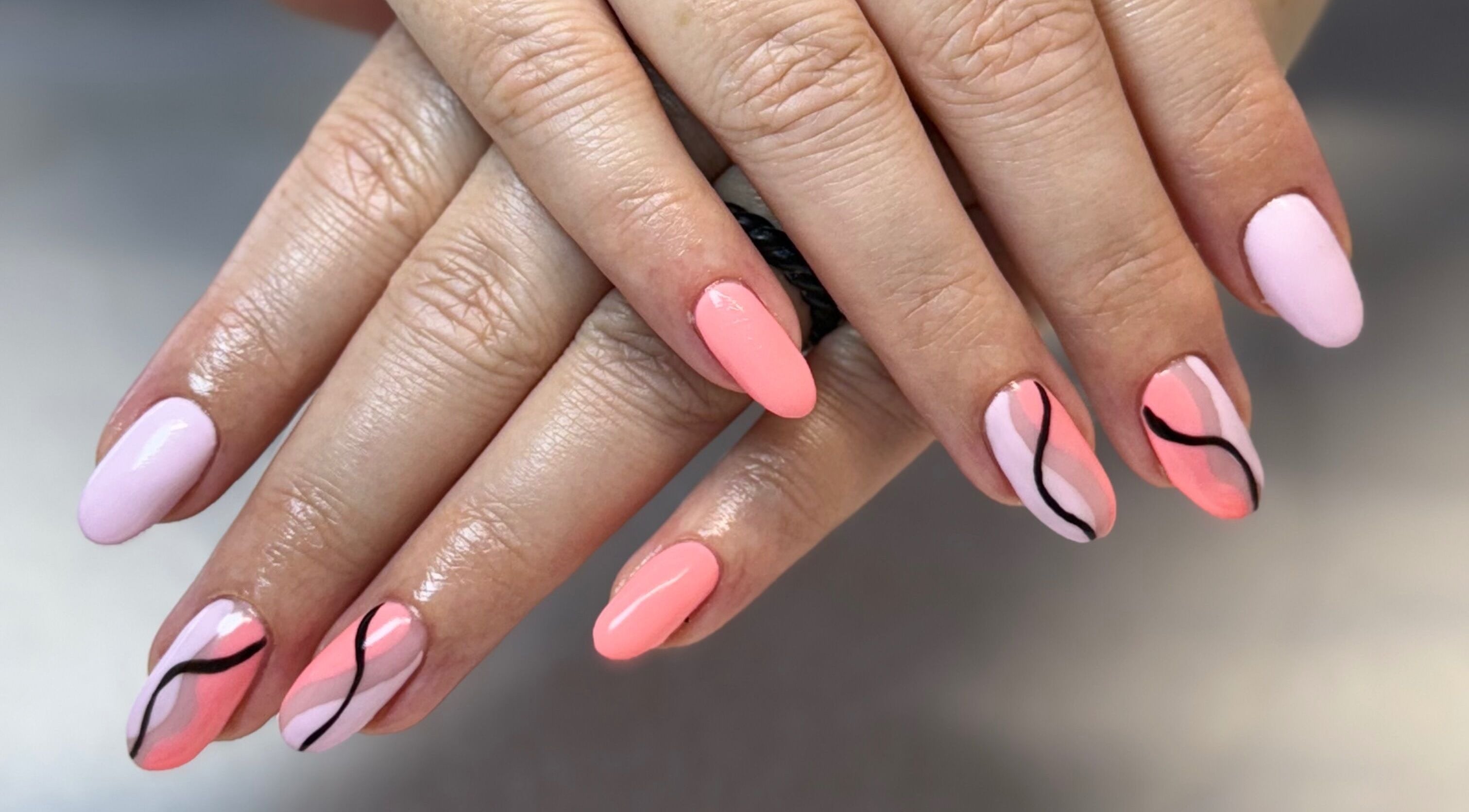 Elegant nail art with pink and black wavy designs at Creative Touch by RK, Tauranga, Bay of Plenty, NZ.
