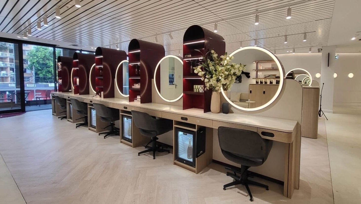 Sleek styling stations at Jazz Man Hair Gallery, Bondi Junction, New South Wales, AU, with modern decor.