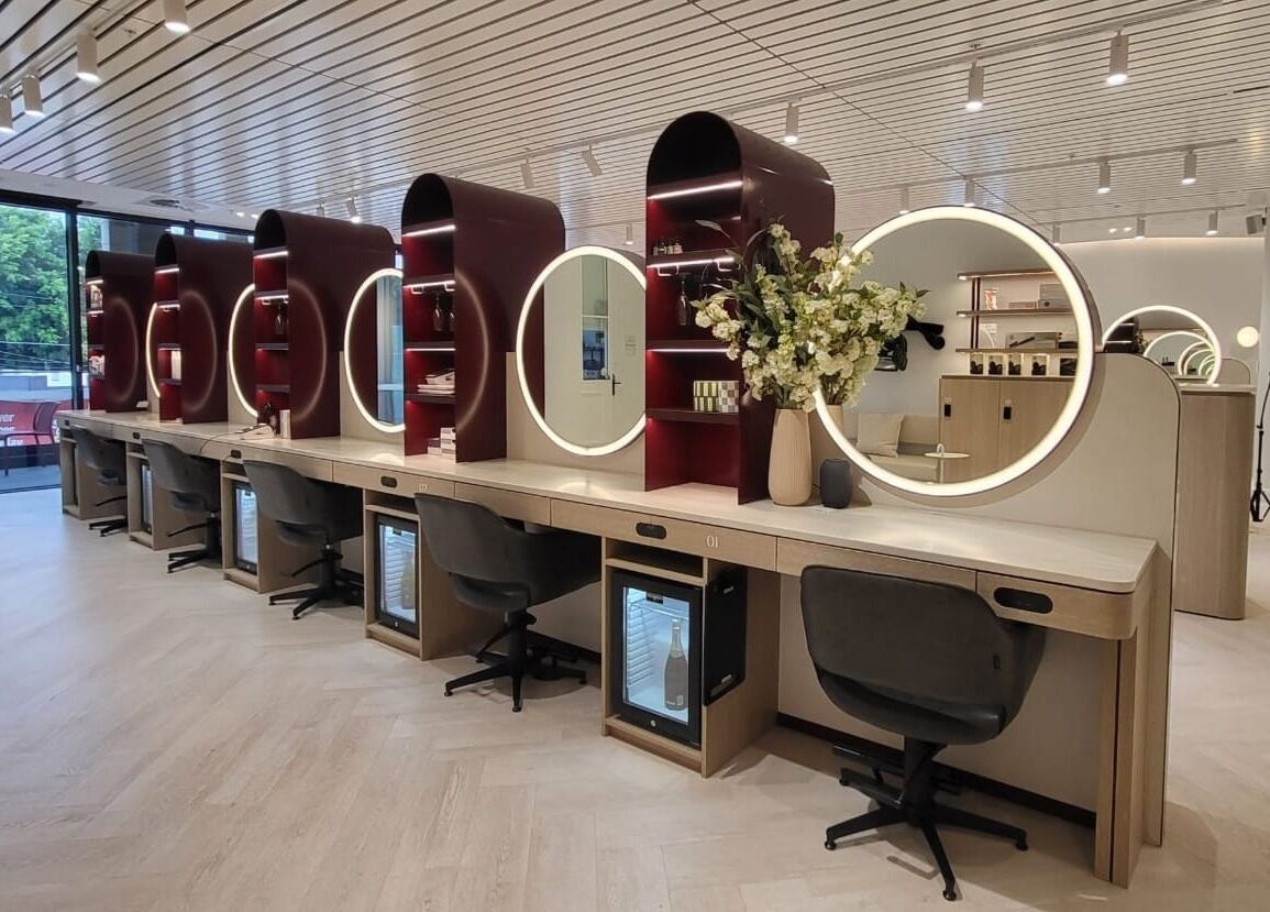 Sleek styling stations at Jazz Man Hair Gallery, Bondi Junction, New South Wales, AU, with modern decor.