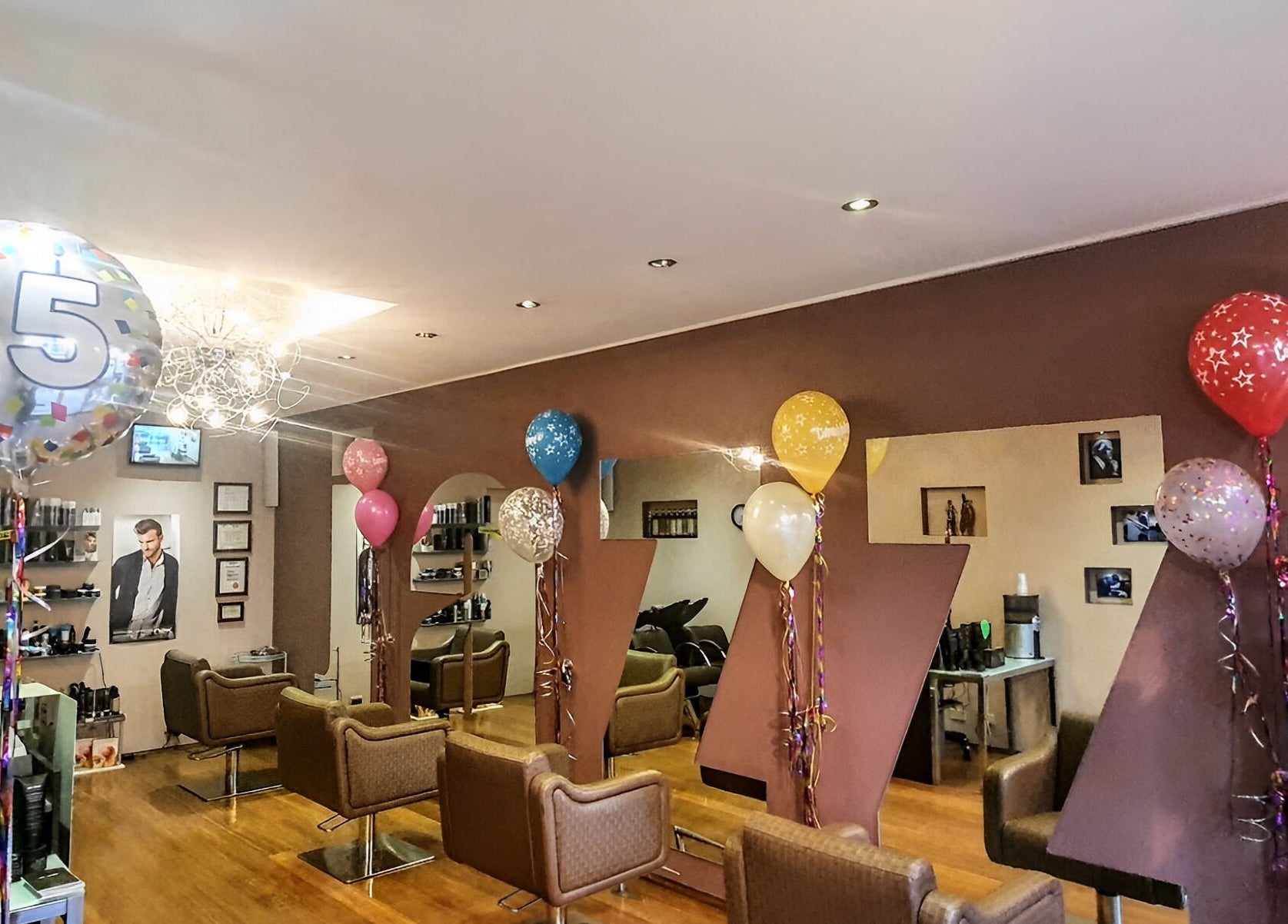 Jazz Man Hair Gallery in Bondi Junction, New South Wales, AU with festive balloons and stylish decor.