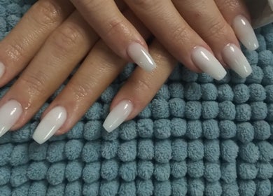 Manicured hands with ombre nails at Betty's Touch Beauty, Pretoria, Gauteng, ZA.