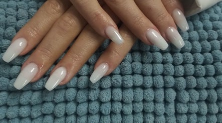 Manicured hands with ombre nails at Betty's Touch Beauty, Pretoria, Gauteng, ZA.