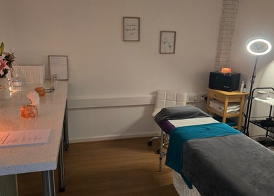 Cozy treatment room at Beauty aesthetics by mel, St Helens, England, GB, showcasing spa bed and ambient decor.