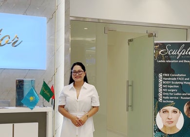 Entrance to Sculptor by Aray Kairkanova Beauty center, Abu Dhabi, AE featuring welcoming staff.