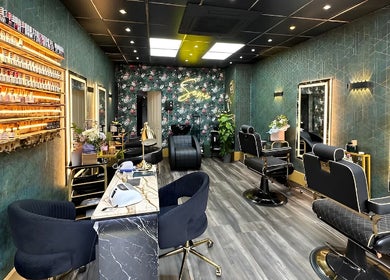 Chic interior of Somi’s Hair and Beauty in Glasgow, Scotland, GB, showcasing stylish chairs and polished decor.