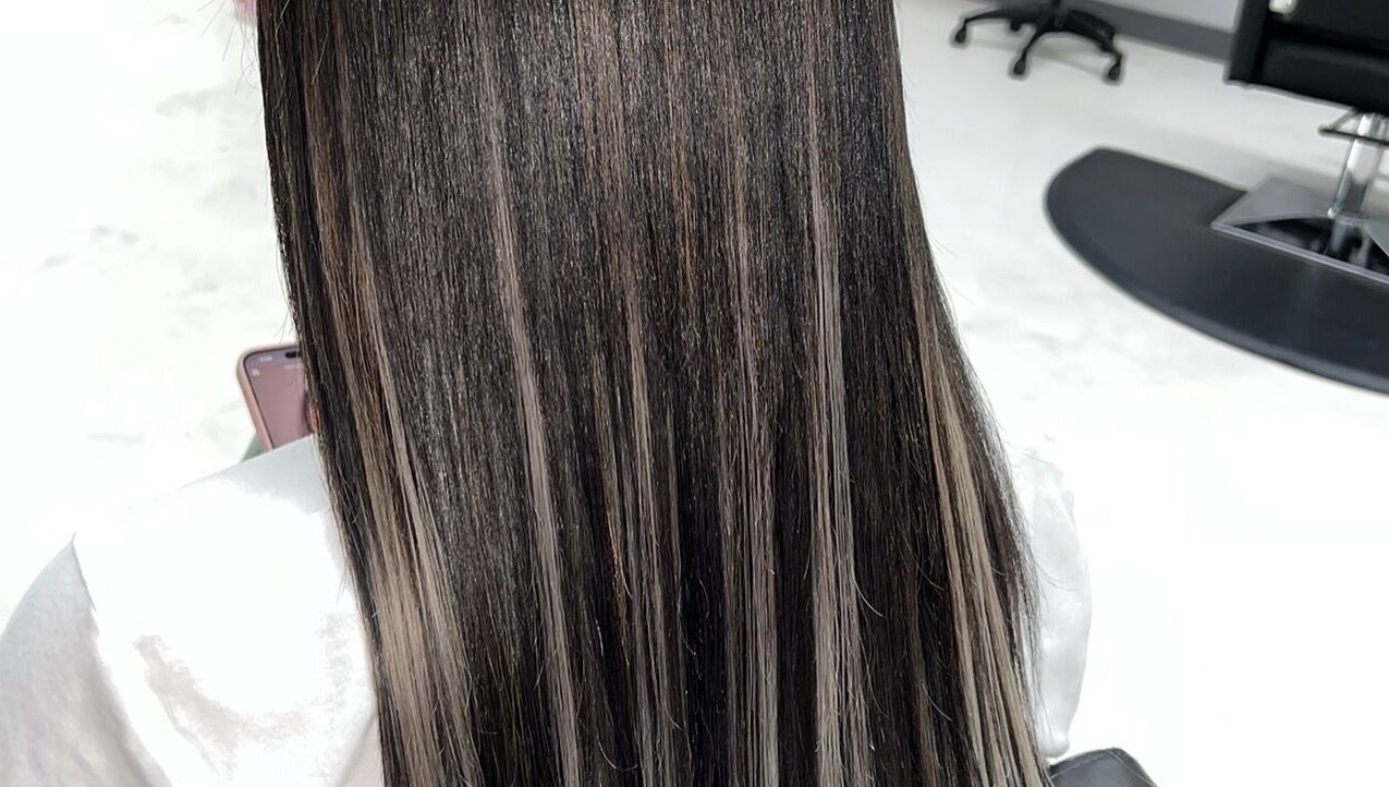 Sleek straight hair at Glam Sanctuary, Stone Mountain, Georgia, US, showcasing salon's styling expertise.