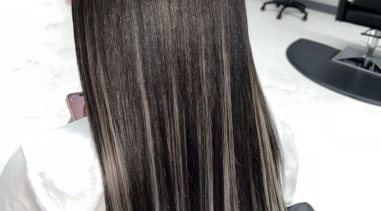Sleek straight hair at Glam Sanctuary, Stone Mountain, Georgia, US, showcasing salon's styling expertise.