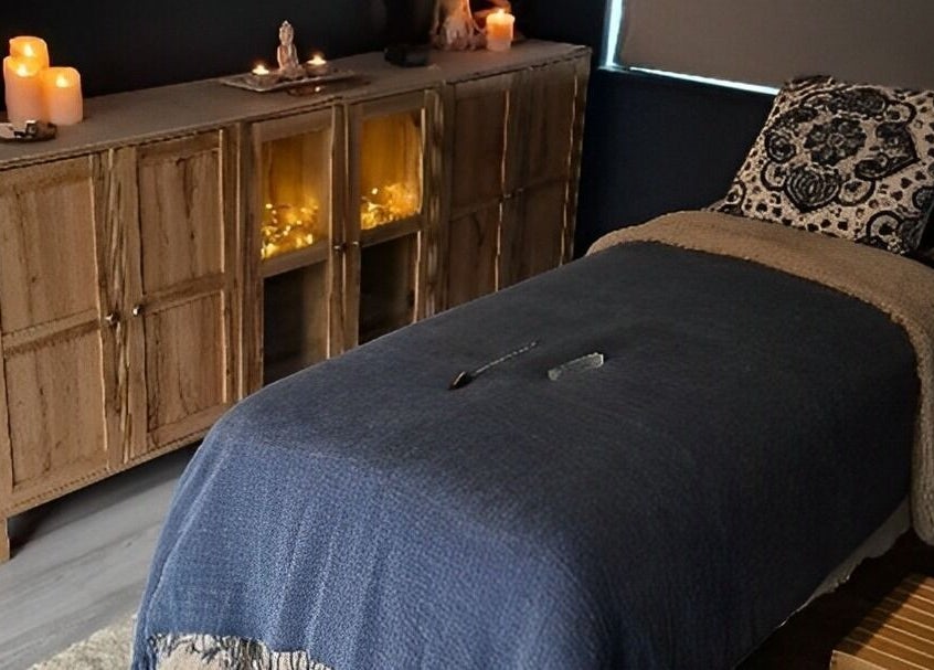 Relaxing therapy room at Riversview Reiki, Callan, County Kilkenny, IE, with candles and cozy decor.