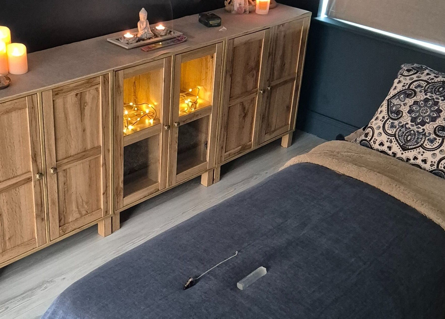 Cozy treatment room at Riversview Reiki, Callan, County Kilkenny, IE, featuring a tranquil bed and soothing decor.