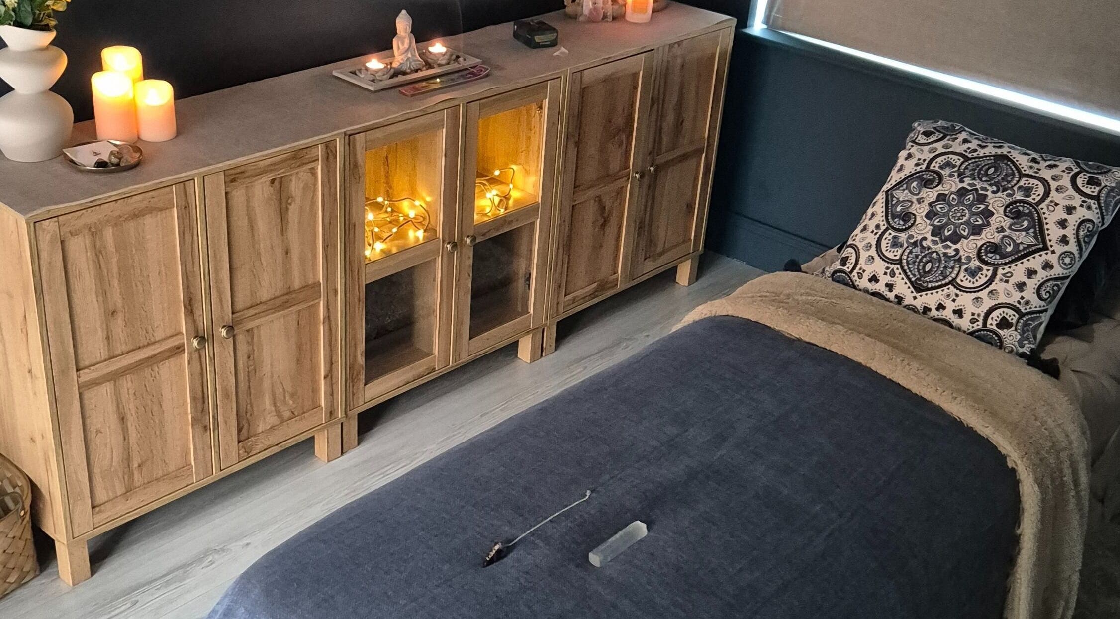 Cozy treatment room at Riversview Reiki, Callan, County Kilkenny, IE, featuring a tranquil bed and soothing decor.