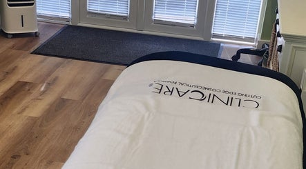 Relaxing treatment room at Cherry Tree Beauty, Yaxley, England, GB with a professional massage table.