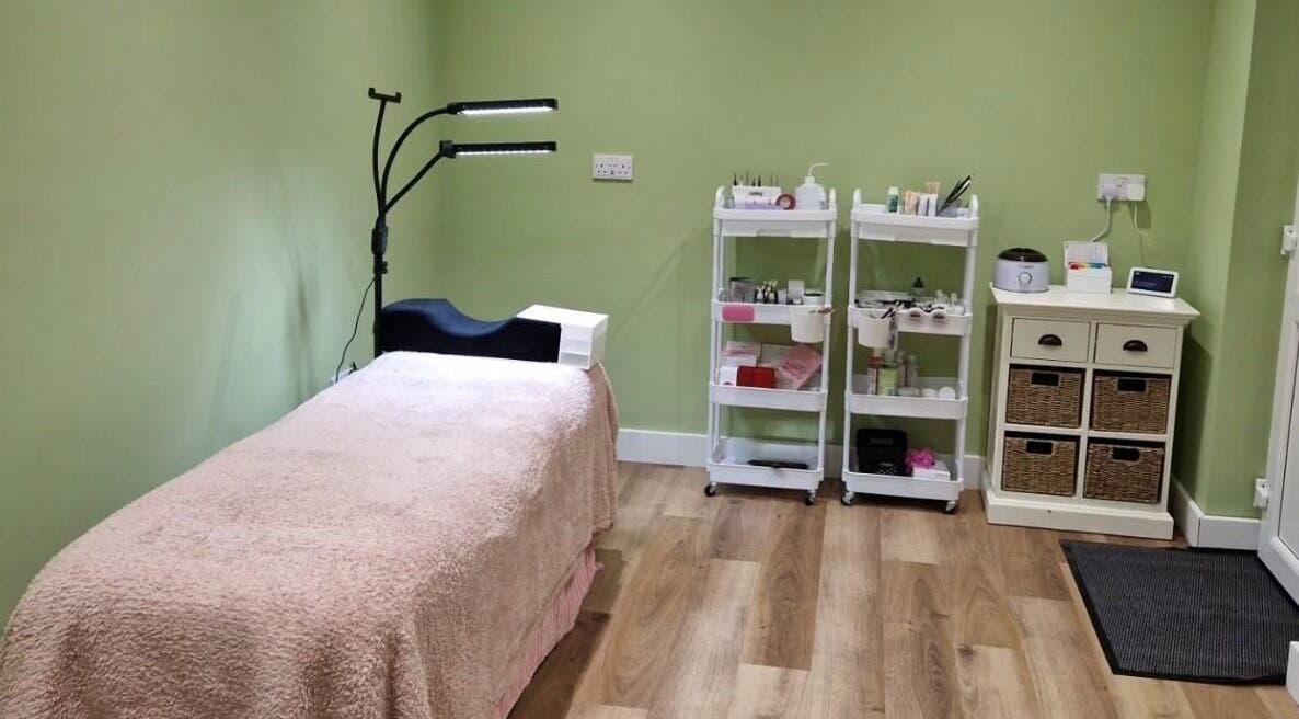Beauty therapy room at Cherry Tree Beauty, Yaxley, England, GB featuring a treatment bed and spa equipment.
