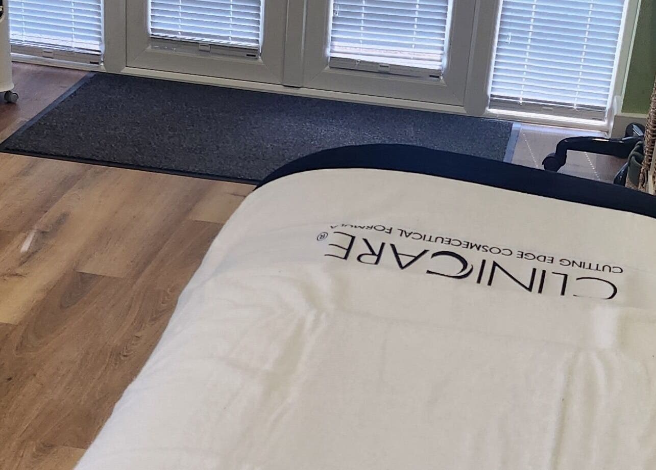 Relaxing spa bed at Cherry Tree Beauty, Yaxley, England, GB with natural light from French doors.