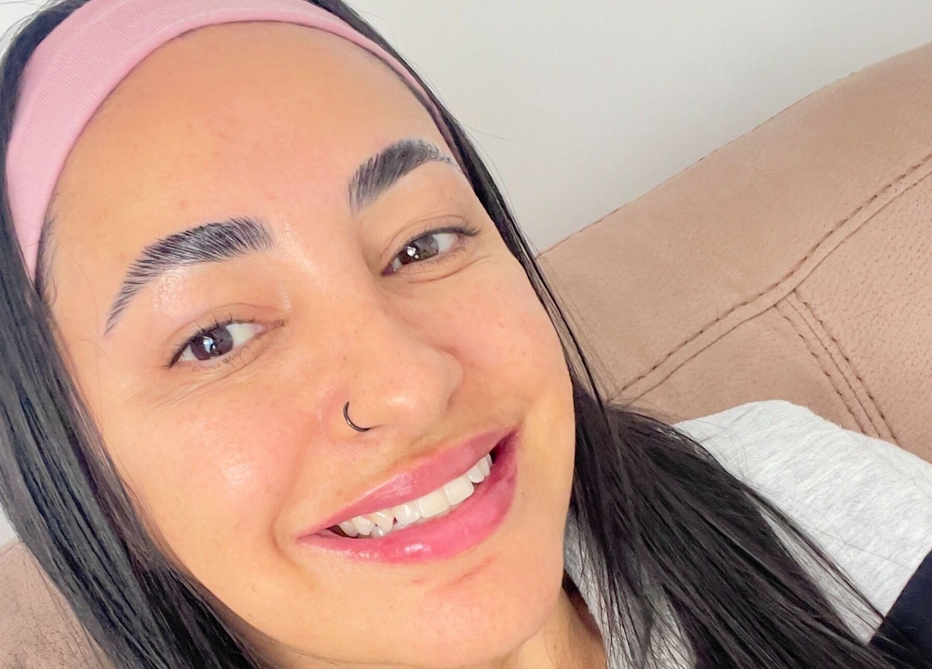 Smiling client showcasing eyebrow styling at All You Eyebrows, Dublin, County Dublin, IE.