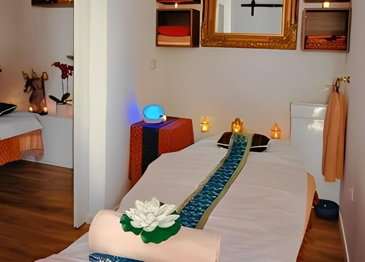 Tranquil massage room at The Andaman Sanctuary, Twickenham, England, GB with calming decor and soft lighting.
