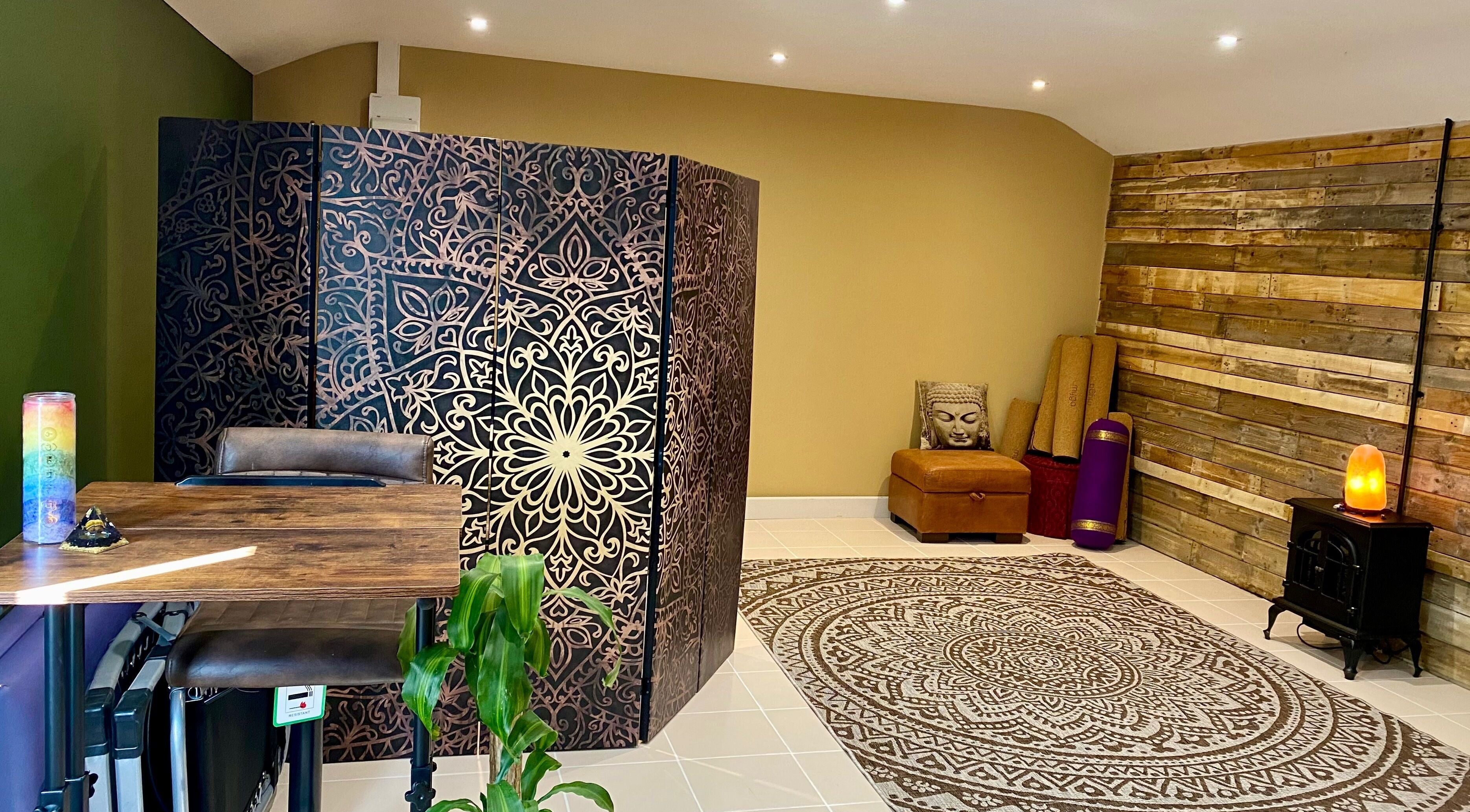 Calm interior of Shropshire Wellness Studio in Shrewsbury, England, GB, featuring a decorated room with earthy tones.