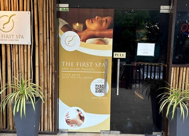 Entrance of The FIRST Spa in Cebu City, Central Visayas, PH with bamboo decor and inviting sign.