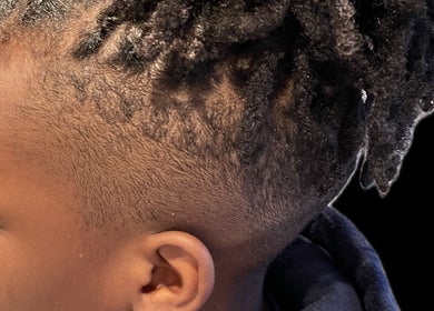 Detailed hair twist style at The Loc Station, Bathgate, Scotland, GB. Perfect for natural hair enthusiasts.