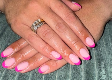Close-up of elegant pink French manicure by Your Nail Tech Anna Jones in Middle Rasen, England, GB.