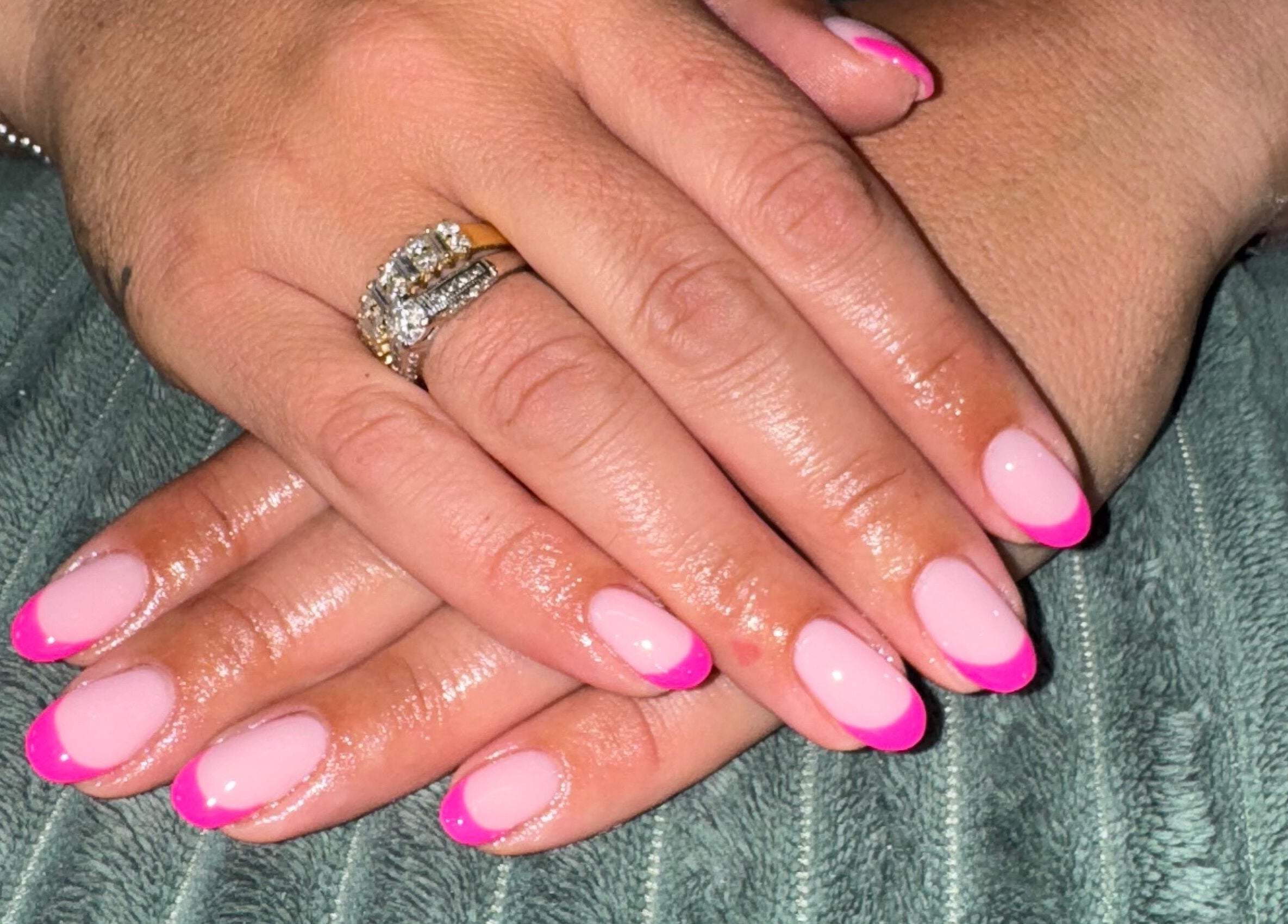 Close-up of elegant pink French manicure by Your Nail Tech Anna Jones in Middle Rasen, England, GB.