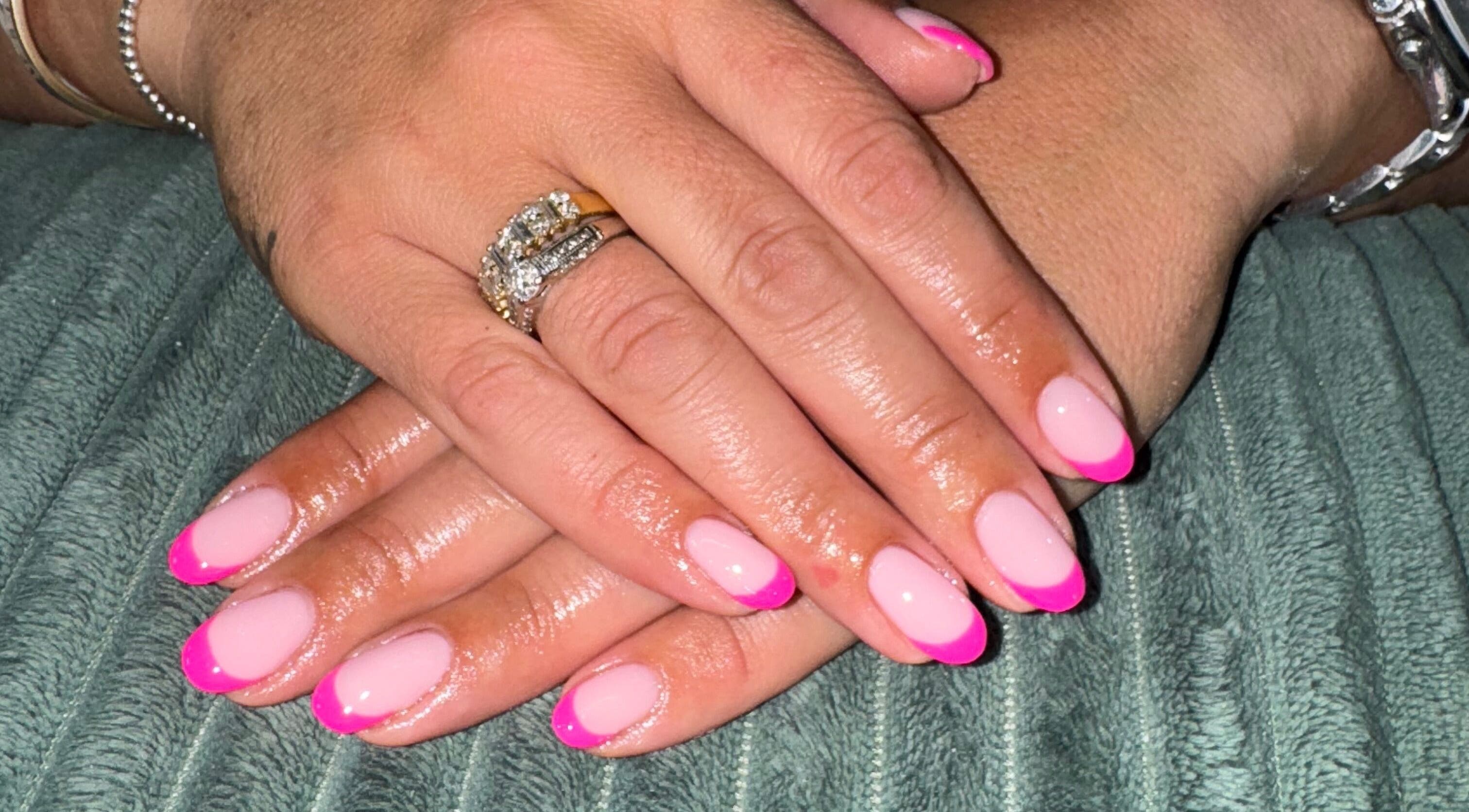 Close-up of elegant pink French manicure by Your Nail Tech Anna Jones in Middle Rasen, England, GB.
