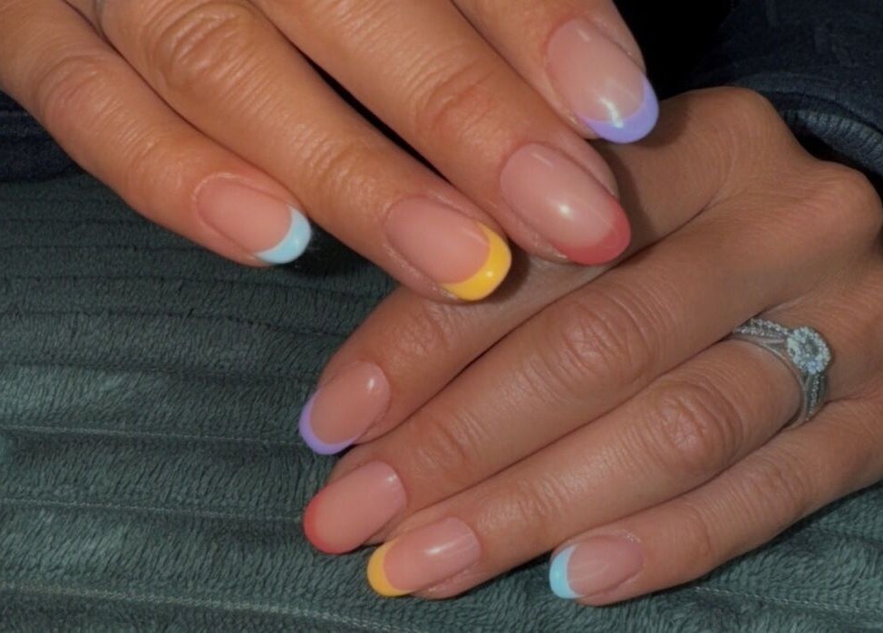 Colorful manicure by Your Nail Tech Anna Jones, Middle Rasen, England, GB features vibrant tips on natural nails.