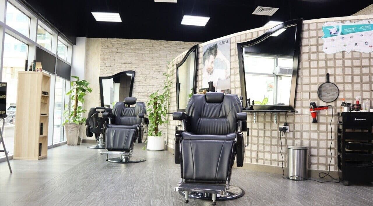 Elegant barber chairs at Sumr Gents Saloon, Dubai, Dubai, AE showcasing luxury and comfort.