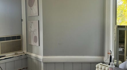 Elegant corner at Enchanted Beautique, Coopers Plains, Queensland, AU, featuring modern art and decor.
