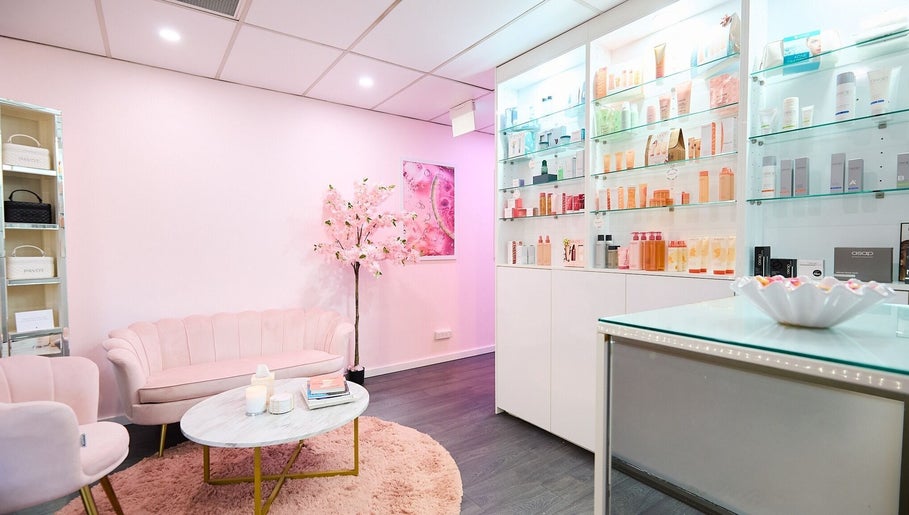 Elegant beauty lounge at Beauty Circle, Sydney, New South Wales, AU with pink decor and displayed products.
