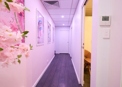 Beauty Circle's pink floral hallway in Sydney, New South Wales, AU symbolizes tranquility and elegance.