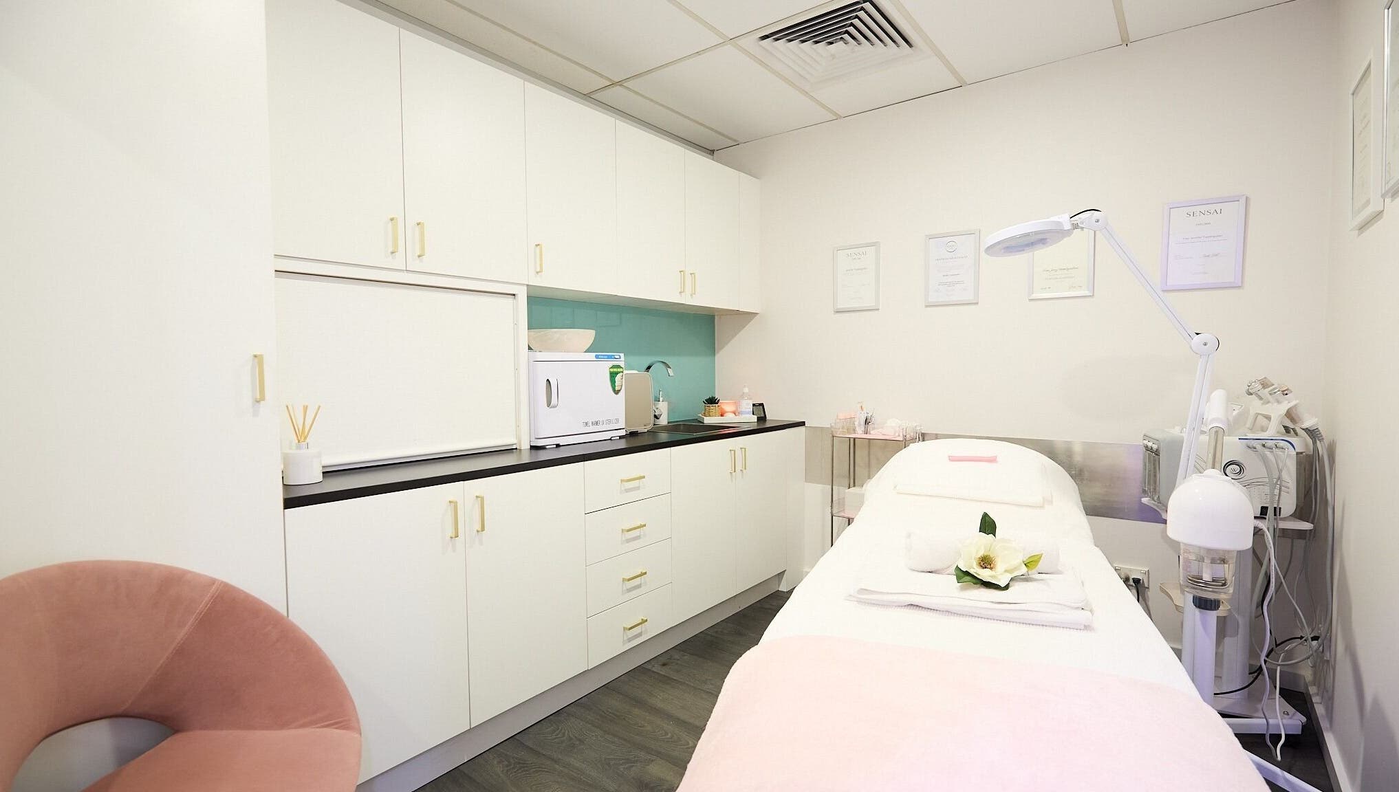 Tranquil spa room at Beauty Circle, Sydney, New South Wales, AU with modern decor and treatment bed.