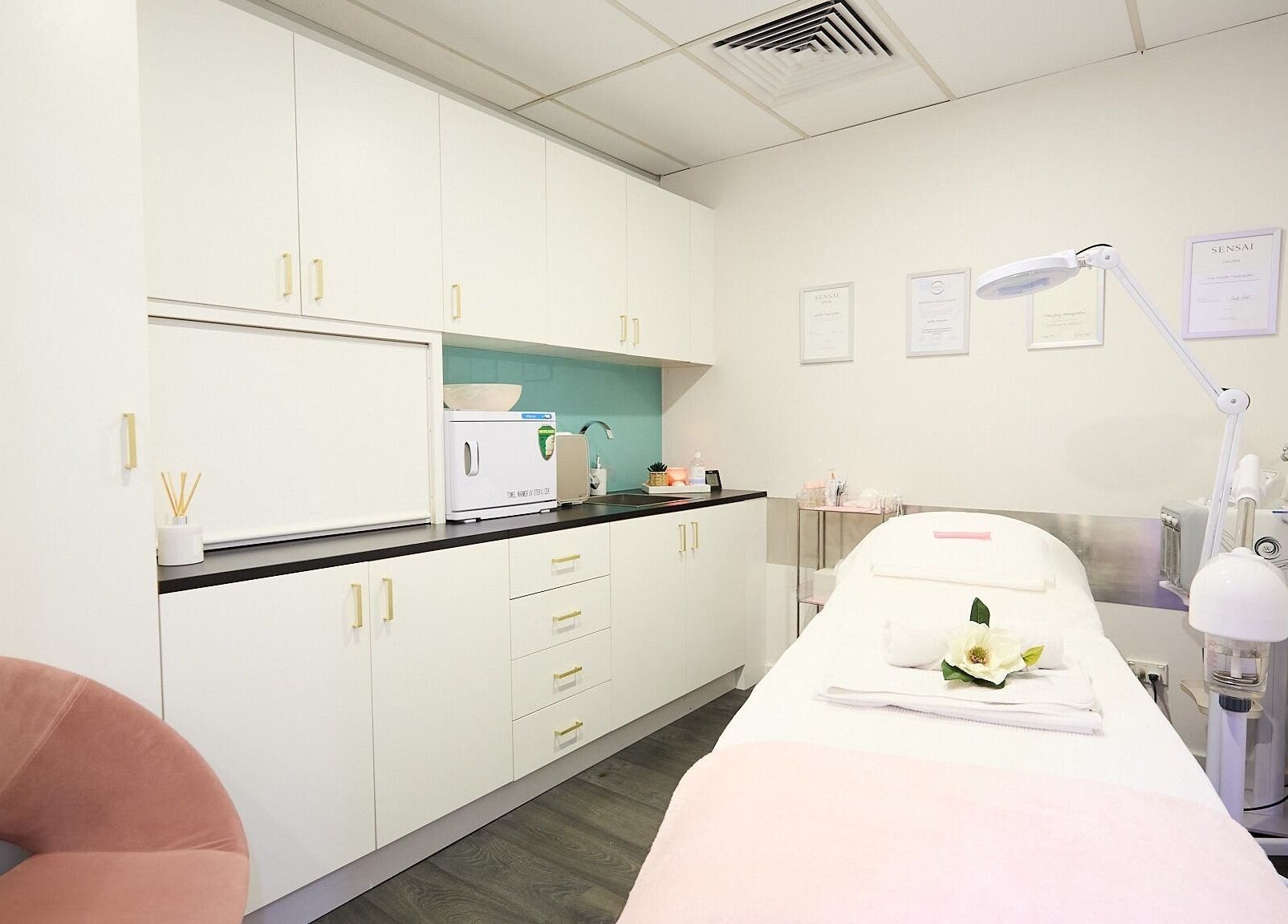 Tranquil spa room at Beauty Circle, Sydney, New South Wales, AU with modern decor and treatment bed.