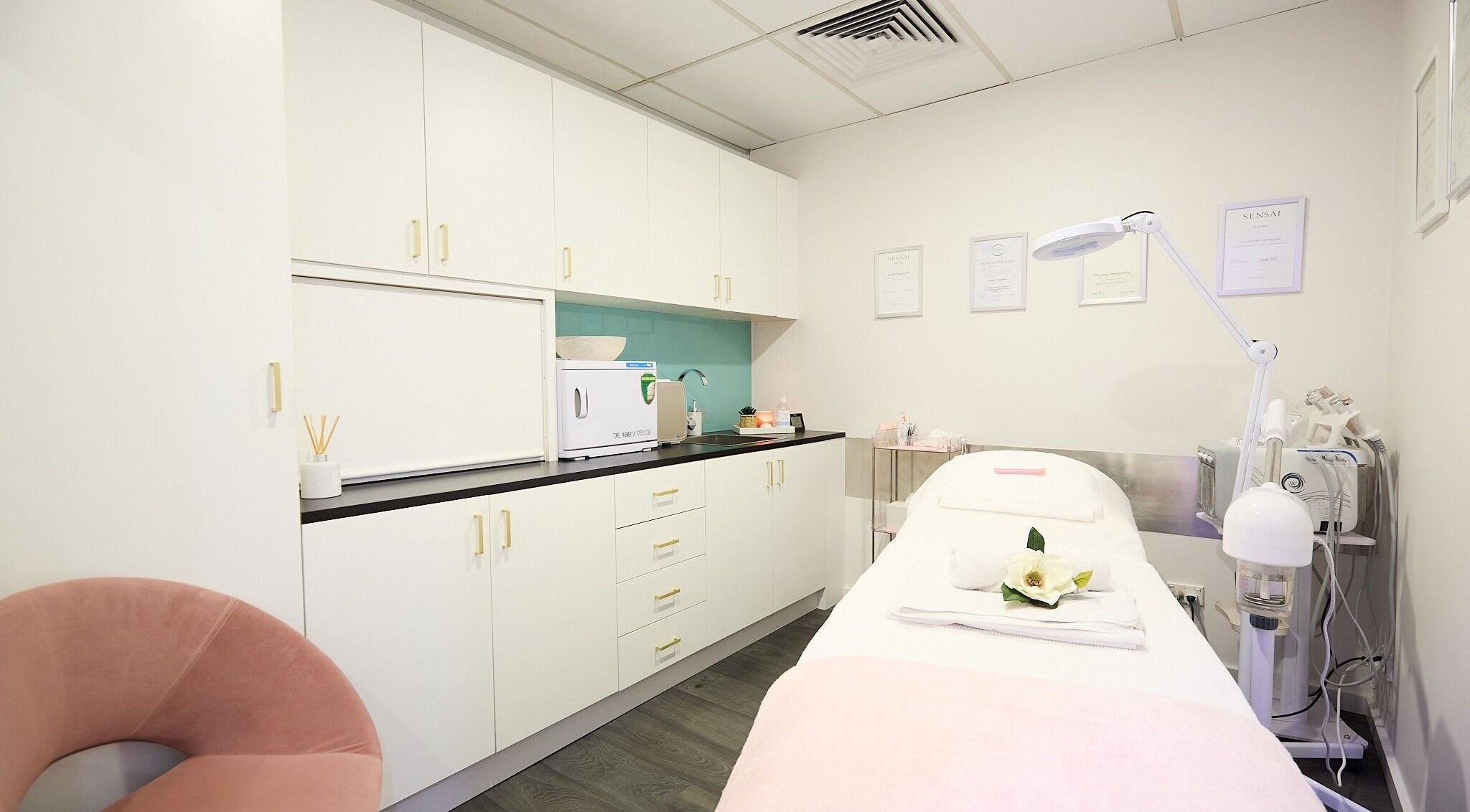 Tranquil spa room at Beauty Circle, Sydney, New South Wales, AU with modern decor and treatment bed.